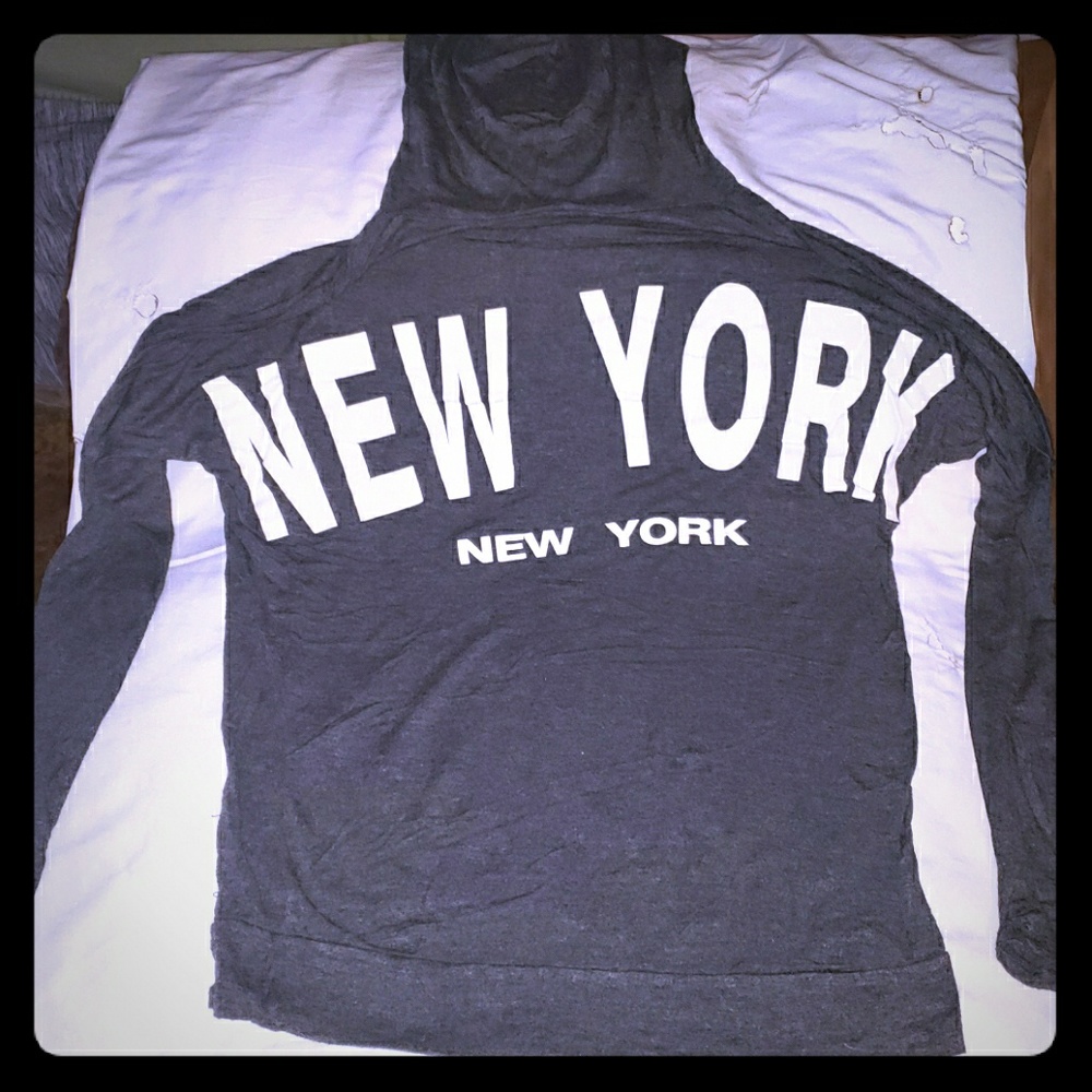 A hooded long sleeved shirt